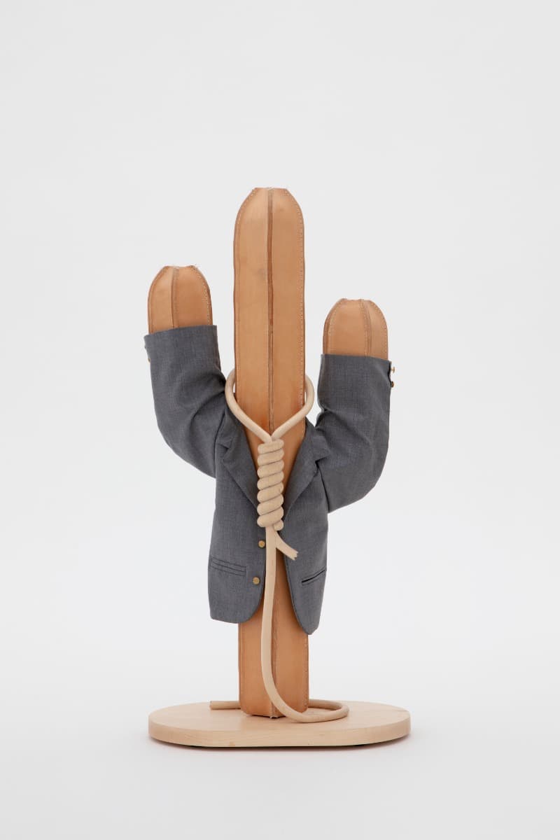 Nick Doyle. “Surrender” · Wood, leather, brass, merino wool · 84 x 40 x 25 cm | 33 x 15 1/2 x 9 1/2 in. · 2021 Photo: Guillaume Ziccarelli. Courtesy of the Artist and Perrotin. · Nick Doyle. “Surrender” · Wood, leather, brass, merino wool